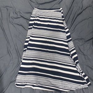 A womens black and white striped long maxi dress. Size Md. A Roz & Ali design.